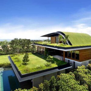 Edificio moderno diseñado con principios de arquitectura sostenible, techos verdes y paneles solares